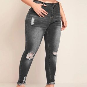 Plus size ripped raw hem skinny wash jeans